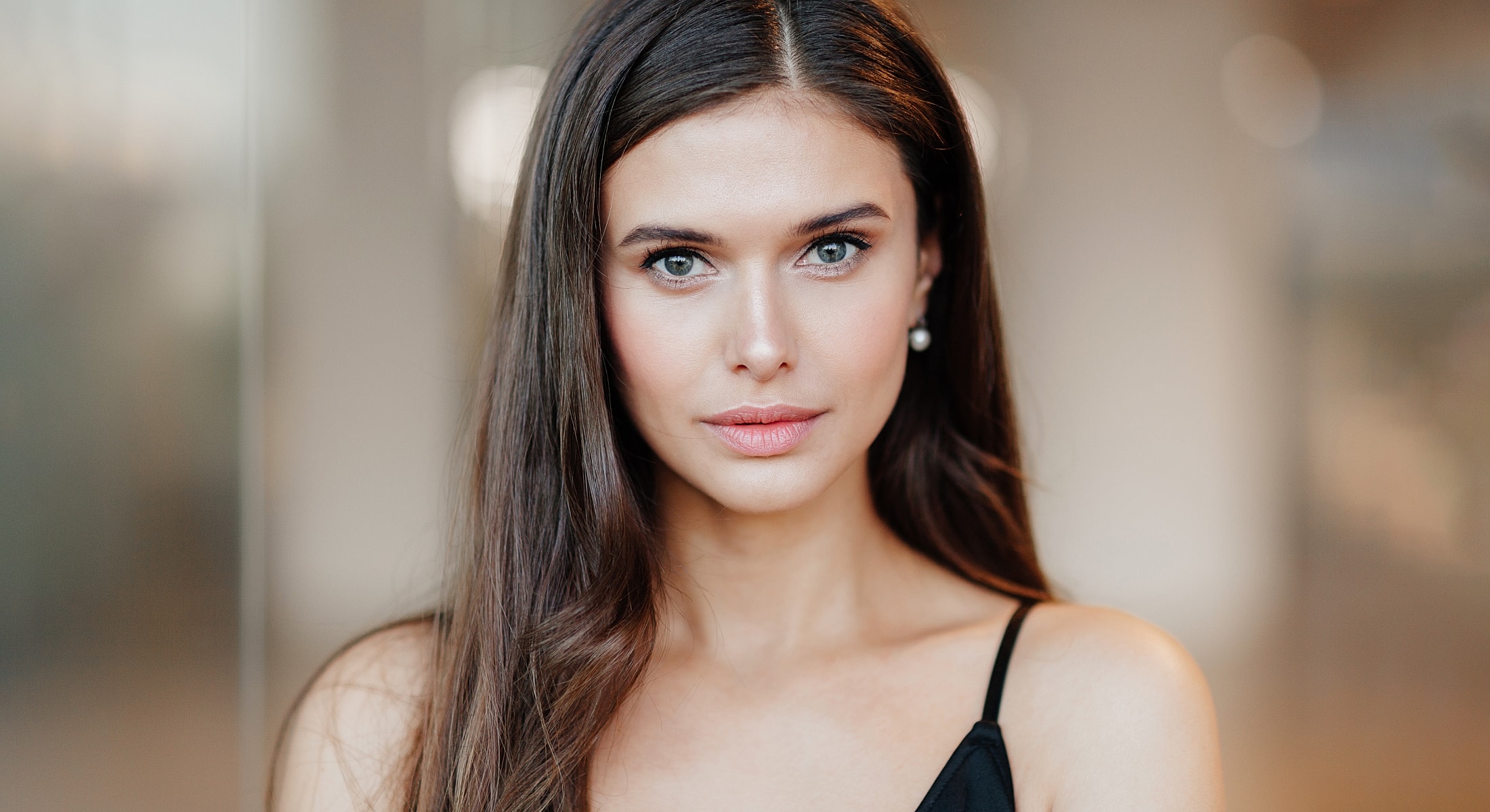 Portrait of a woman with long hair.